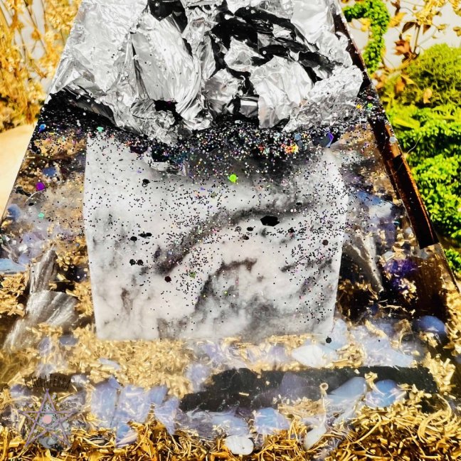 Orgonite pyramid for gentle transformation and concentration