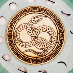 Wooden coaster with a snake for transformation, intuition and energy