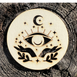 Dřevěný podtácek se symbolem oka