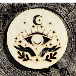 Dřevěný podtácek se symbolem oka